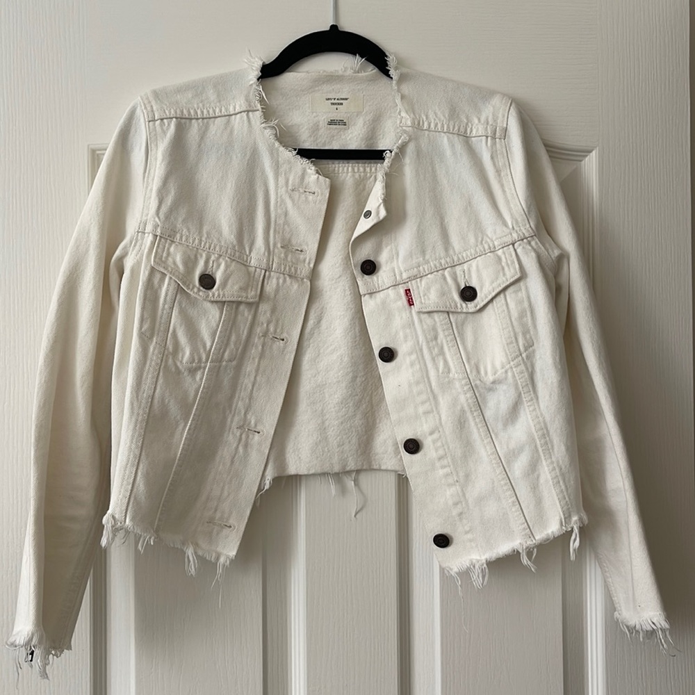 White jean jacket with zipper details